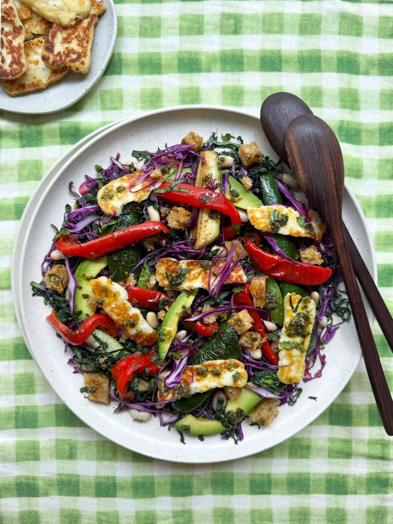 Grilled haloumi salad with kale, red cabbage, capsicum, zucchini and white beans